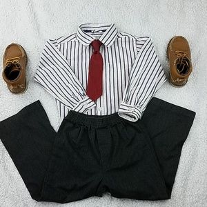 The children place coordinating pants and shirt